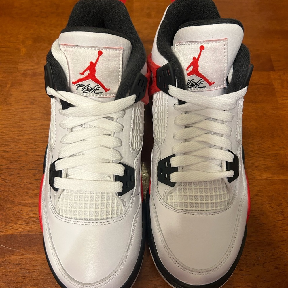 Brand new Air Jordan 4 Retro (GS) white/fire red/black size 3.5 youth never worn